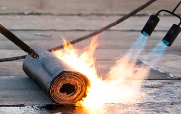 Fleur De Lis asphalt flat roofing repairs